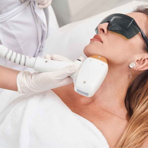 Female Receiving Laser Facials Genesis- One-session treatment | Manhattan Laser Spa in NYC