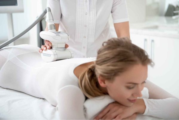 Young Woman Receiving Relaxing Lipo Massage At Spa | Manhattan Laser Spa in NYC