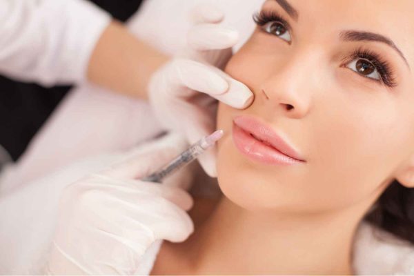 Young Woman Getting One Syringe of Juvederm Volbella Treatment | Manhattan Laser Spa in NYC