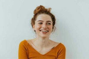 Smiling Young Lady with age spots Sunspot on her face | Manhattan Laser Spa in NYC