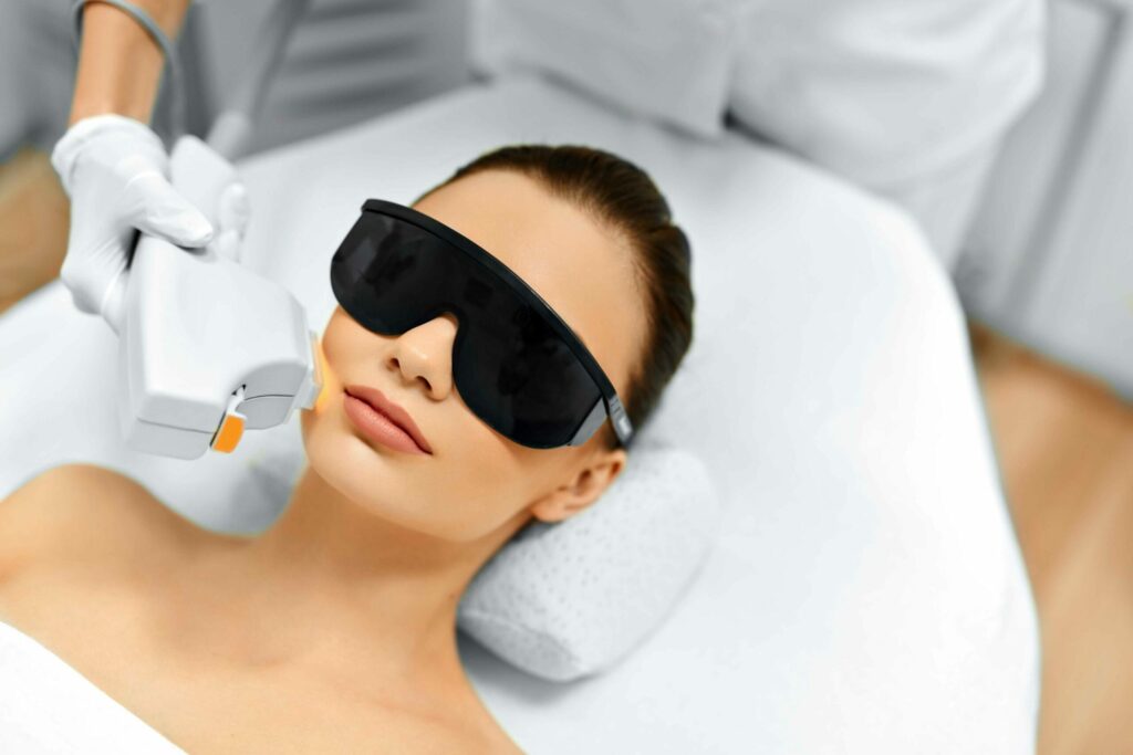 Woman receiving professional laser hair removal in miami spa